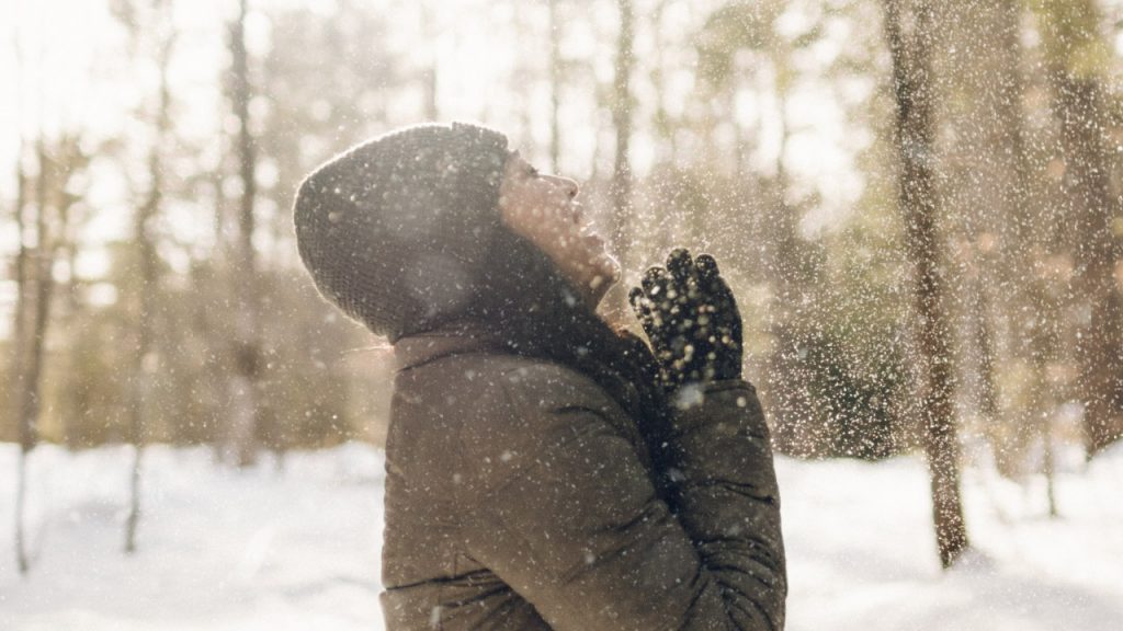 Happy woman in snow