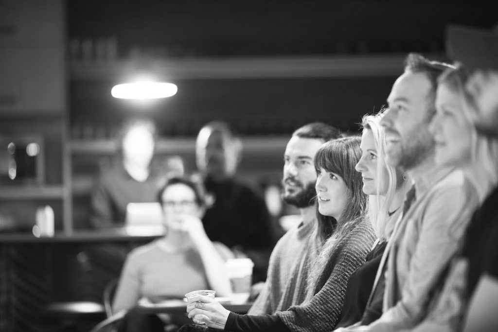 Attendees watching speaker